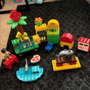 LEGO Duplo Zoo Adventure Pieces With Mini Figure, Animal’s And Train car